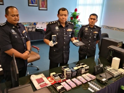 马来西亚警察捣毁一家庭式网赌公司