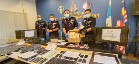 马来西亚警方破跨国股票网赌集团抓获99人 其中57名中国人