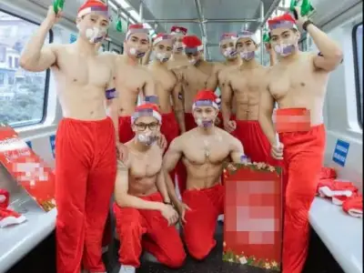 越南轻轨再次上热门！一群男子不穿衣服在轻轨上拍广告
