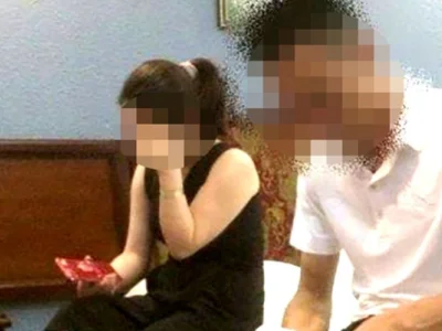 越南男子带儿子去宾馆抓奸，抓住妻子和其情人后他决定“打个劫”